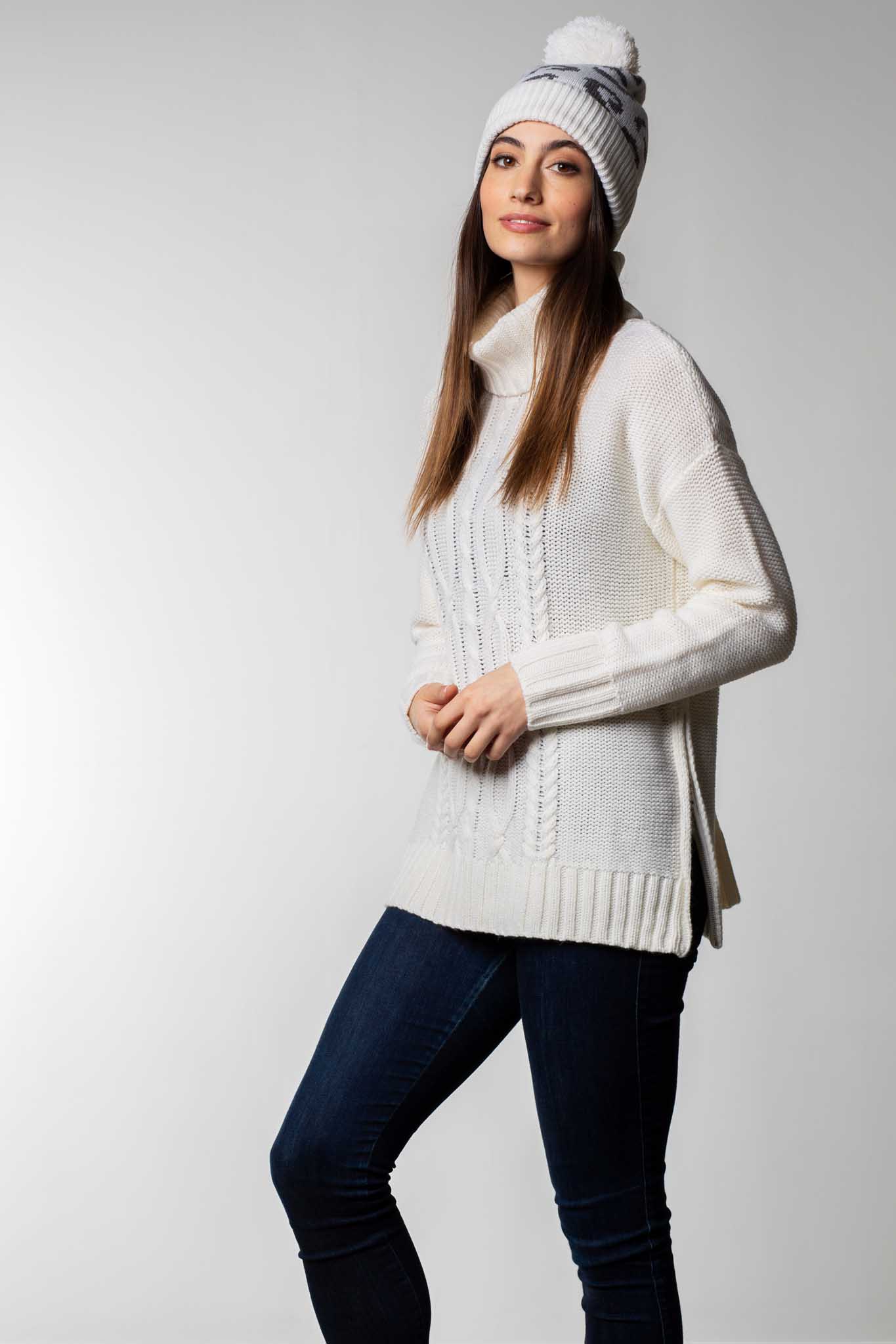 Fashion model in knitwear in studio.