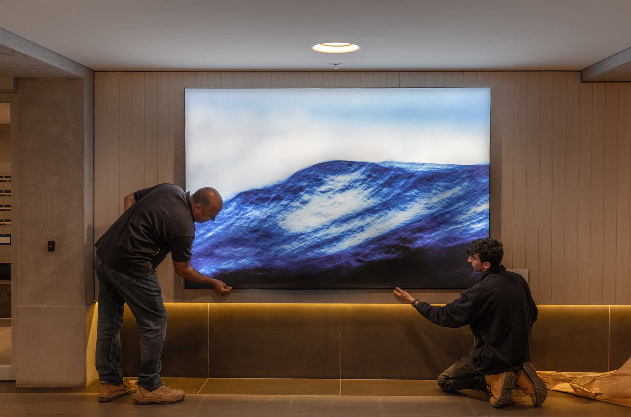 50 Albert Road, foyer, LED artwork by Saville Coble - Install Emerald Building Led Panel fabric artwork.